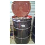 55 gallon metal drum almost full of lead weights