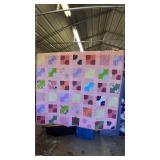 Handmade square pinks quilt