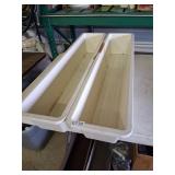 2 long plastic trays