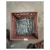 red tote of lead ingots