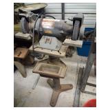 Old Dayton bench grinder on heavy duty cast stand