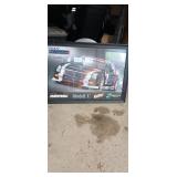 Team Remington Cadillac Framed Poster. Measures