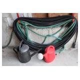 2 Garden Hoses and Watering Cans