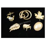 Assortment of Gold Tone Brooches