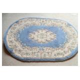 Oval Rug Features a Blue Center w a Floral Design