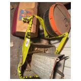 Assorted Metal Tools and Containers in a Wheelbarrow