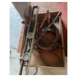 Box of Assorted Tools: Level, Jumper Cables, and Lug Wrench