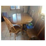 Dining table with 6 chairs and 2 leaves
