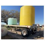 1970 Fruehauf 24 ft Flatbed Trailer (VIN WD4140), single axle, 1000-20 tires, with poly Liquid Storage Tanks