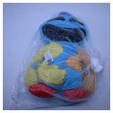 Colorful Plush Toy in Plastic Wrap