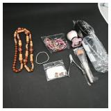Assortment of Jewelry and Beauty Tools