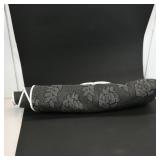 Decorative Fabric Roll and Floral Rug