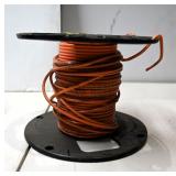 Spool of Orange Electrical Wire