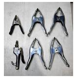 Assortment of Metal Clamps and Air Tool