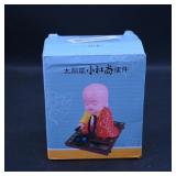 Solar-Powered Monk Figurine with Moving Head