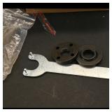 Metal Wrench with Two Black Fittings