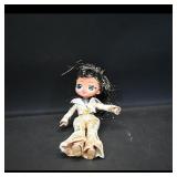 Small Fashion Doll ï¿½ Black Hair, Gold-Trim Outfit