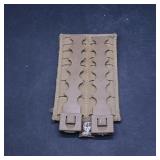 Pair of Tan Plastic Strap Clips on Fabric Backing