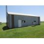 LARGE CITY LOT W/ 27' X40' MACHINE SHED SHOP.