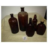 5- AMBER GLASS BPTTLES SOME CORK TOP