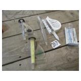 6- ADVERTISING RAIN GUAGES