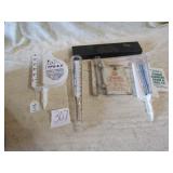 6- ADVERTISING RAIN GUAGES