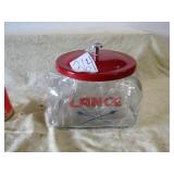 GLASS LANCE  JAR W/ RED LID