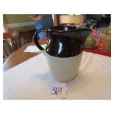 BROWN & WHITE STONE PITCHER