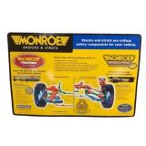 Monroe Shocks & Struts Embossed Metal Sign