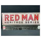 Red Man Embossed Metal Sign