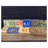 IA, CA. NH, WI License Plates
