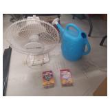 Comfort Edge Fan, Watering Can, and Glue Traps