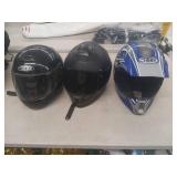 Three Motorcycle Helmets