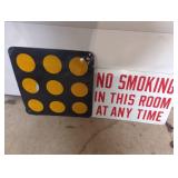 Two Metal Signs with Distinct Designs