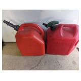 Two Red Plastic Gas Cans