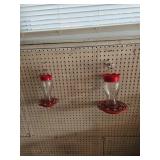 Two Red Glass Bird Feeders