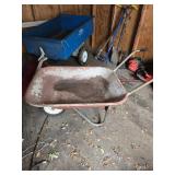 Metal Wheelbarrow with Rusted Basin