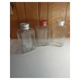 Three Ribbed Glass Pitchers