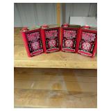 Four Marvel Mystery Oil Cans