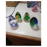 Four Glass Paperweights