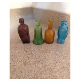 Four Miniature Glass Bottles