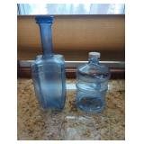 Two Blue Plastic Bottles, Rapi-Kool