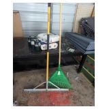 Green Plastic Rake and Metal Rake