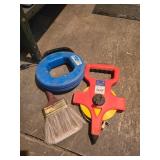 Measuring Reel, Fish Tape, and Paintbrush