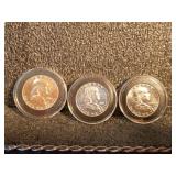 Three Franklin Half Dollars