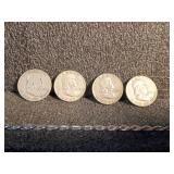 Four Franklin Half Dollars