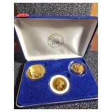 Three Gold-Tone Coin Copies