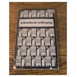 A Handbook on Hanging, in wraps