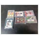 Six Jersey Cards in Protective Cases