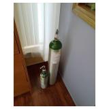 Two Empty Medical Oxygen Tanks